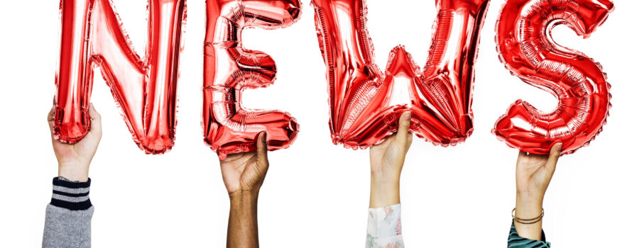 Red helium balloons forming the text news - BuyBoard Approved Vendor